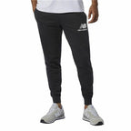 Long Sports Trousers New Balance Essentials Stacked Logo Black Men